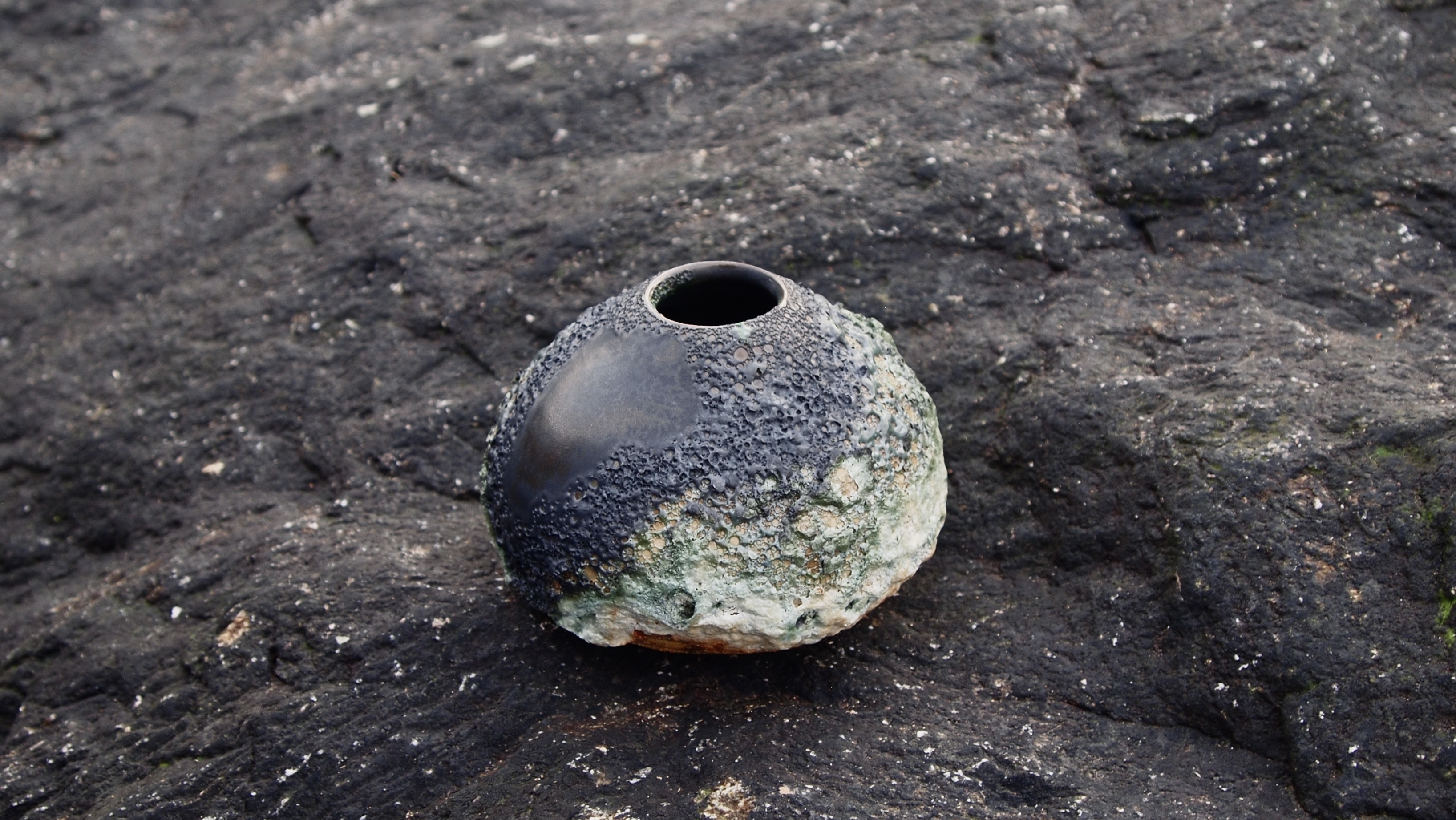 Alastair Smith Ceramics — wide studio shot or flat lay of fired tableware